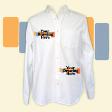 Load image into Gallery viewer, white button up shirt with "your drawing here" text on wearer's right chest and left hip