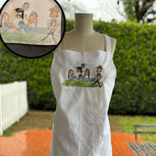 Load image into Gallery viewer, white bib apron with custom embroidery of a 5 person family on a picnic