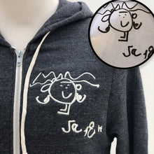 Load image into Gallery viewer, gray zip up hoodie with cream embroidery of a strong muscle stick man with long curly hair