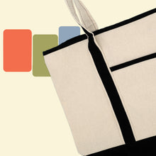 Load image into Gallery viewer, close up of canvas tote bag with black straps