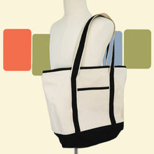 Load image into Gallery viewer, canvas tote bag on mannequin shoulder for scale