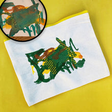 Load image into Gallery viewer, canvas zip up pencil pouch with custom embroidery of child's painting.  painting is an abstract green swirl with flecks of yellow and orange