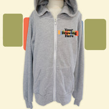 Load image into Gallery viewer, youth light heather gray zip up hoodie with &quot;your drawing here&quot; text on chest
